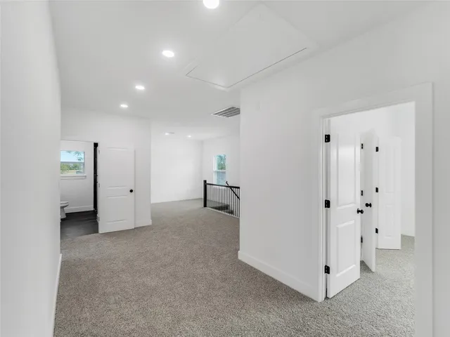 a view of a livingroom with wooden floor