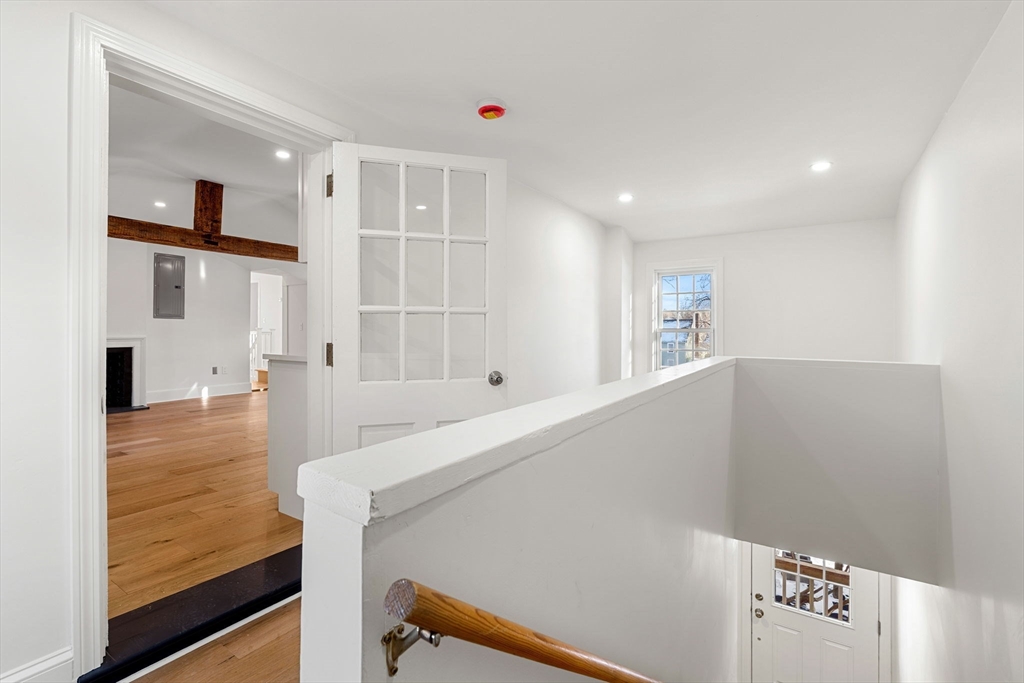 34 Central Street, Unit 2 Rowley, MA 01969 - Photo 25 of 29 a view of kitchen with furniture and wooden floor