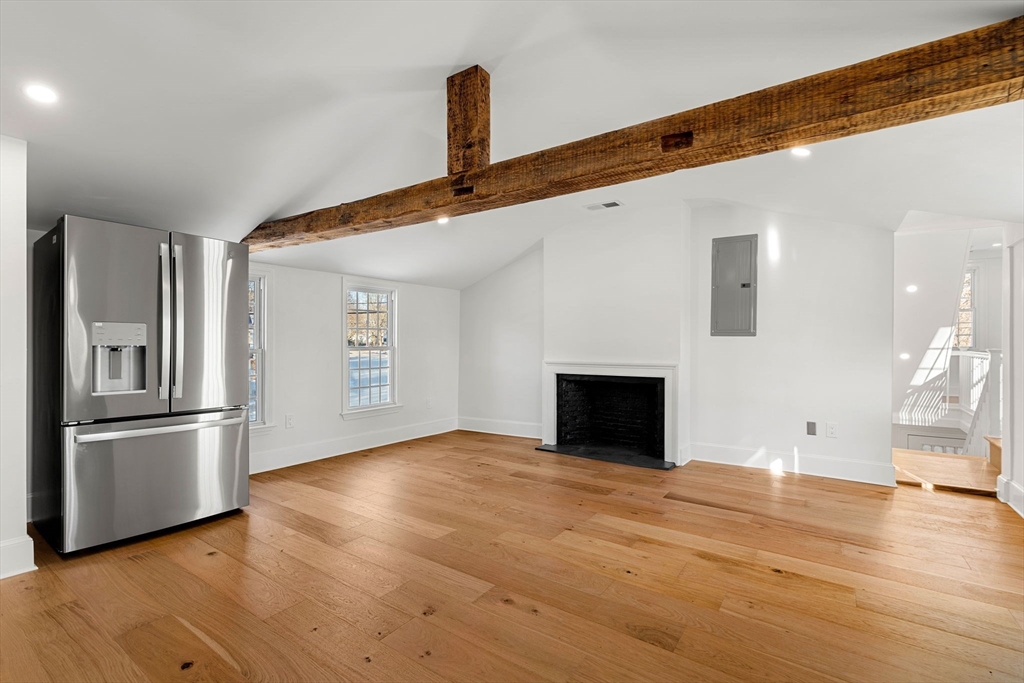 34 Central Street, Unit 2 Rowley, MA 01969 - Photo 5 of 29 a view of empty room with wooden floor