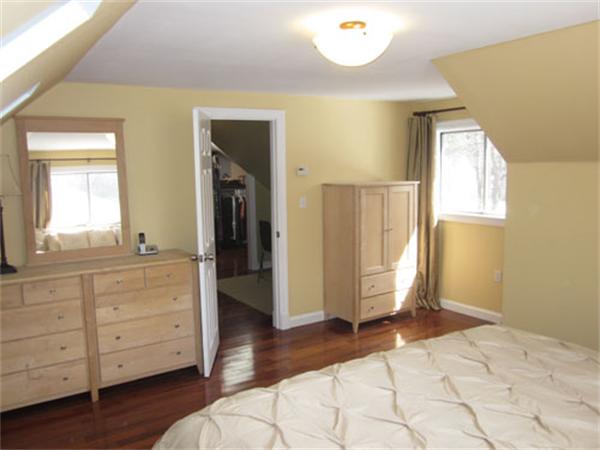 32 Davidson Road Framingham, MA 01701 - Photo 12 of 30 a view of a bedroom with wooden floor and cabinet