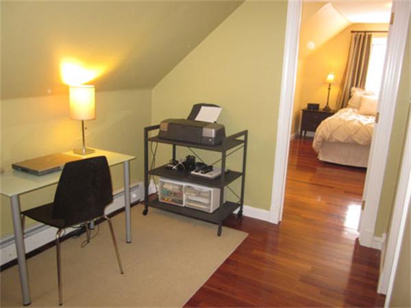 32 Davidson Road Framingham, MA 01701 - Photo 13 of 30 a bedroom with furniture and a wooden floor