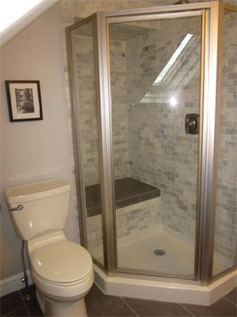 32 Davidson Road Framingham, MA 01701 - Photo 16 of 30 a bathroom with a shower and toilet
