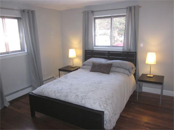 32 Davidson Road Framingham, MA 01701 - Photo 20 of 30 a bedroom with a bed and window