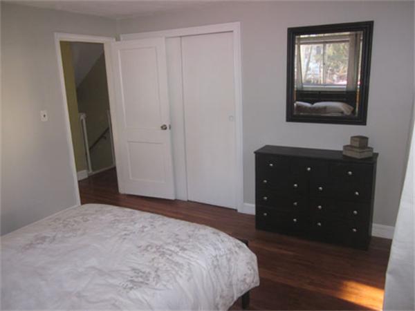 32 Davidson Road Framingham, MA 01701 - Photo 21 of 30 a bedroom with a bed and a dresser