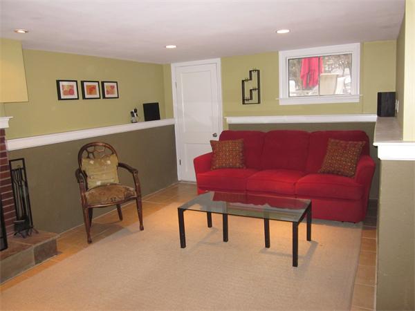 32 Davidson Road Framingham, MA 01701 - Photo 24 of 30 a living room with furniture and a couch
