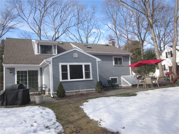 32 Davidson Road Framingham, MA 01701 - Photo 28 of 30 a front view of a house with yard and seating space