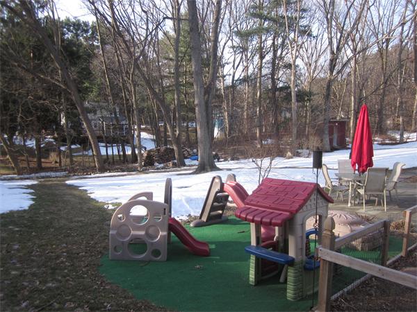 32 Davidson Road Framingham, MA 01701 - Photo 30 of 30 a swimming pool with outdoor seating and yard