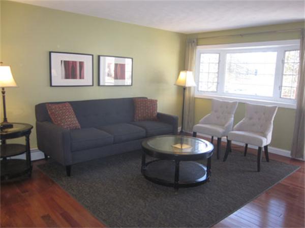 32 Davidson Road Framingham, MA 01701 - Photo 3 of 30 a living room with furniture a window and a potted plant