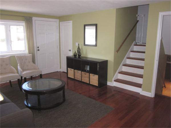 32 Davidson Road Framingham, MA 01701 - Photo 4 of 30 a living room with furniture and a wooden floor