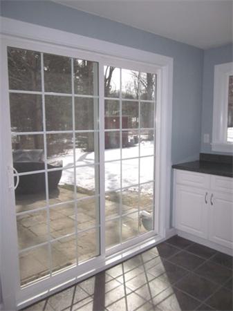 32 Davidson Road Framingham, MA 01701 - Photo 9 of 30 a view of a glass door with a glass door