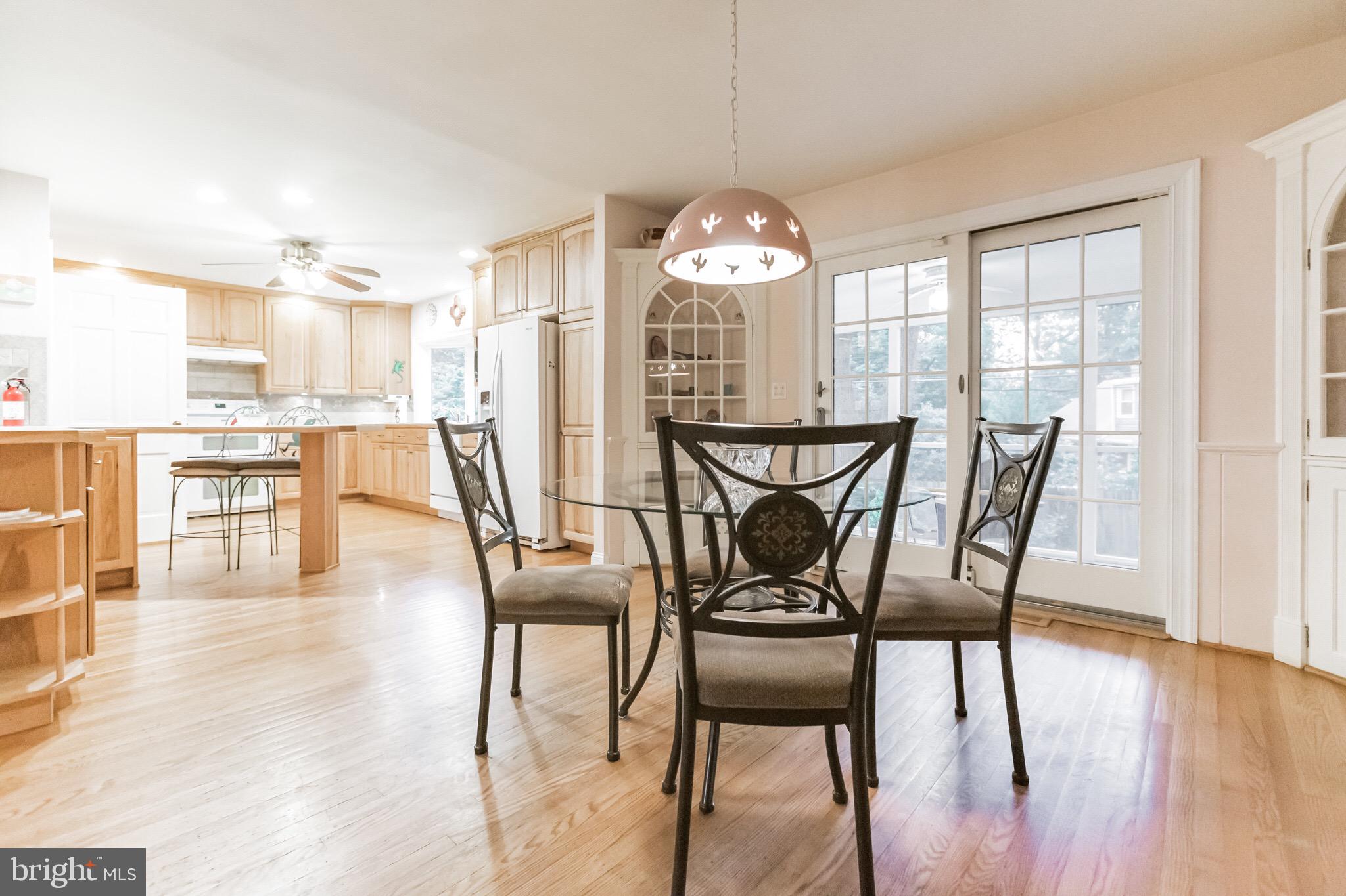 102 Quaint Road Media, PA 19063 - Photo 5 of 21 Dining room, open to kitchen with access to porch