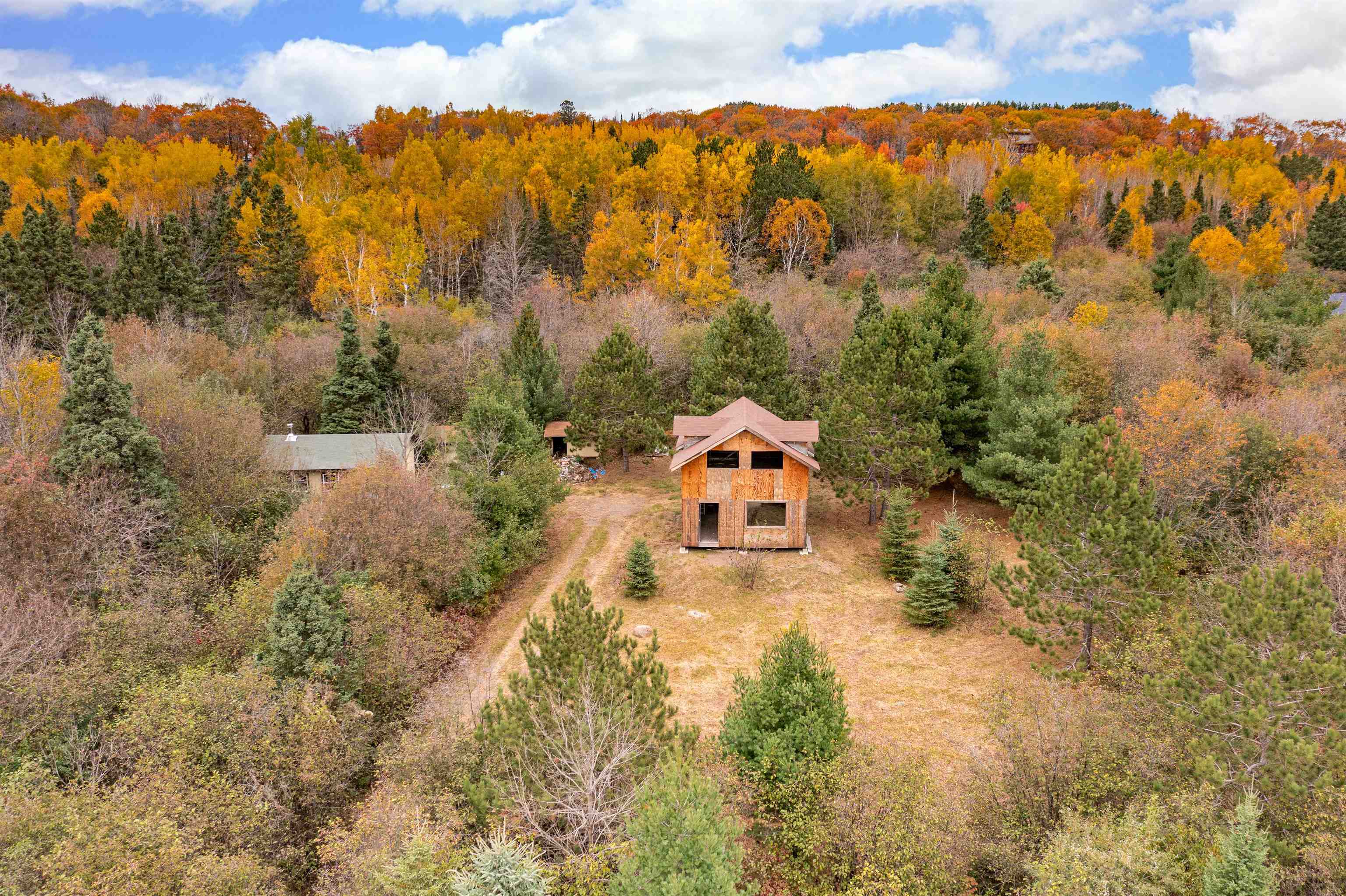 6264 Ryan Road Duluth, MN 55804 - Photo 26 of 30 Aerial view of property and surrounding area featuring a heavily wooded area