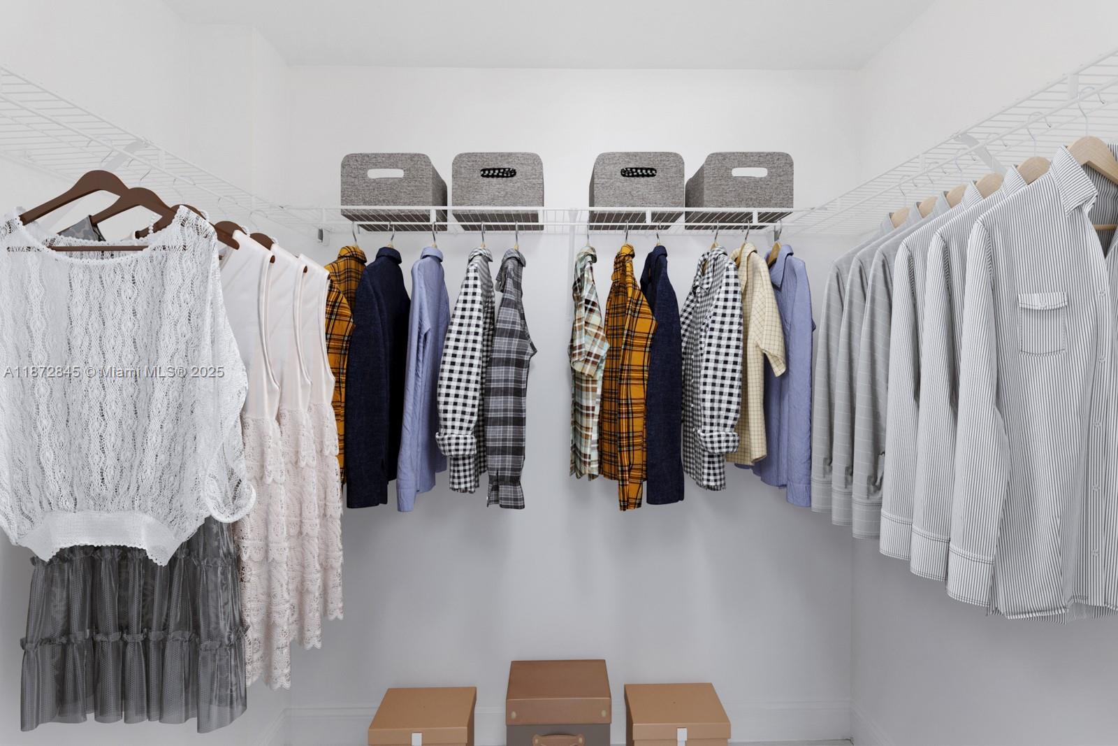 79 Southwest 12th Street, Unit 3211S Miami, FL 33130 - Photo 17 of 32 a view of walk in closet with clothes