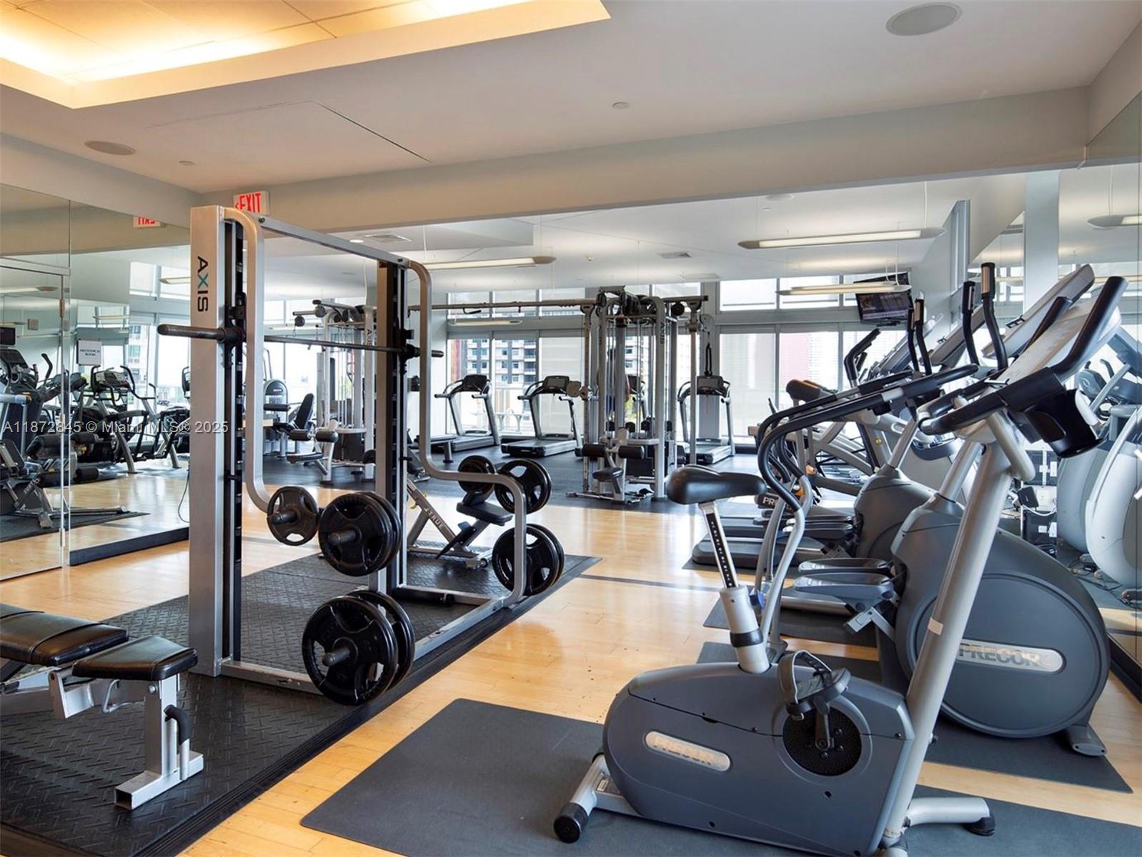 79 Southwest 12th Street, Unit 3211S Miami, FL 33130 - Photo 22 of 32 a view of a room with gym equipment