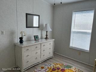 937 Laurel Circle Sebastian, FL 32976 - Photo 15 of 22 a bathroom with a sink a mirror and a window