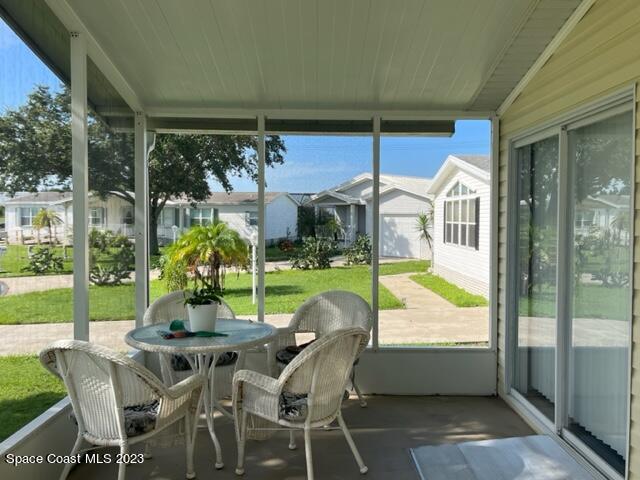 937 Laurel Circle Sebastian, FL 32976 - Photo 2 of 22 a view of a dining room with furniture window and outside view