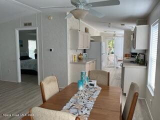 937 Laurel Circle Sebastian, FL 32976 - Photo 7 of 22 a living room with furniture and a table