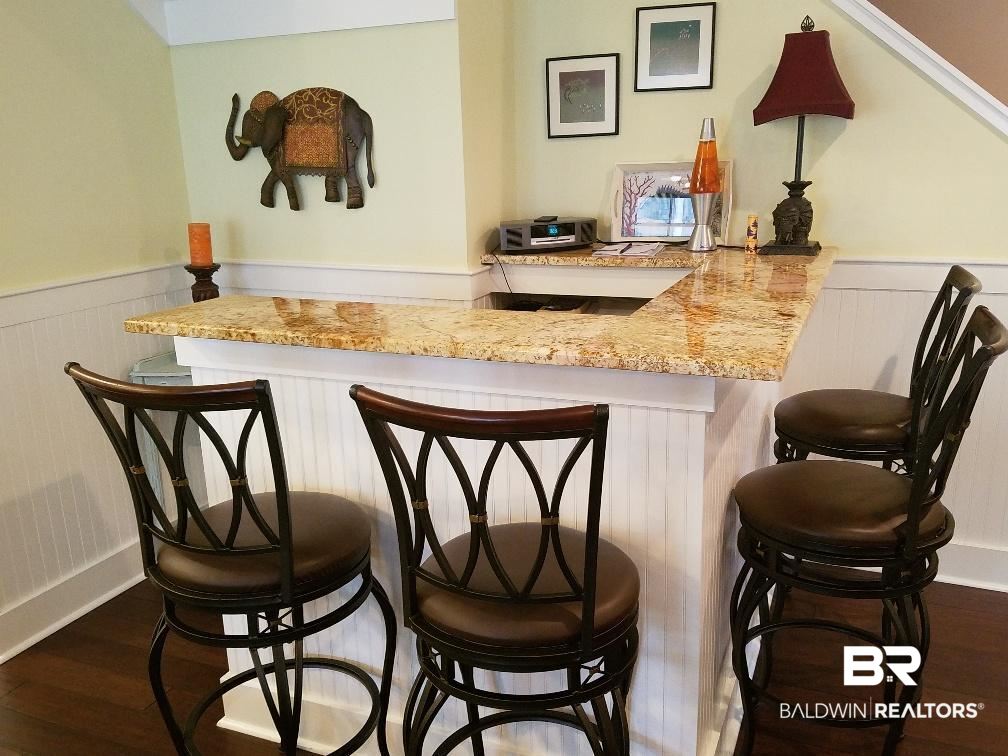 25773 Canal Road, Unit 41 Orange Beach, AL 36561 - Photo 6 of 34 Built- in custom Bar w/granite in Great Room