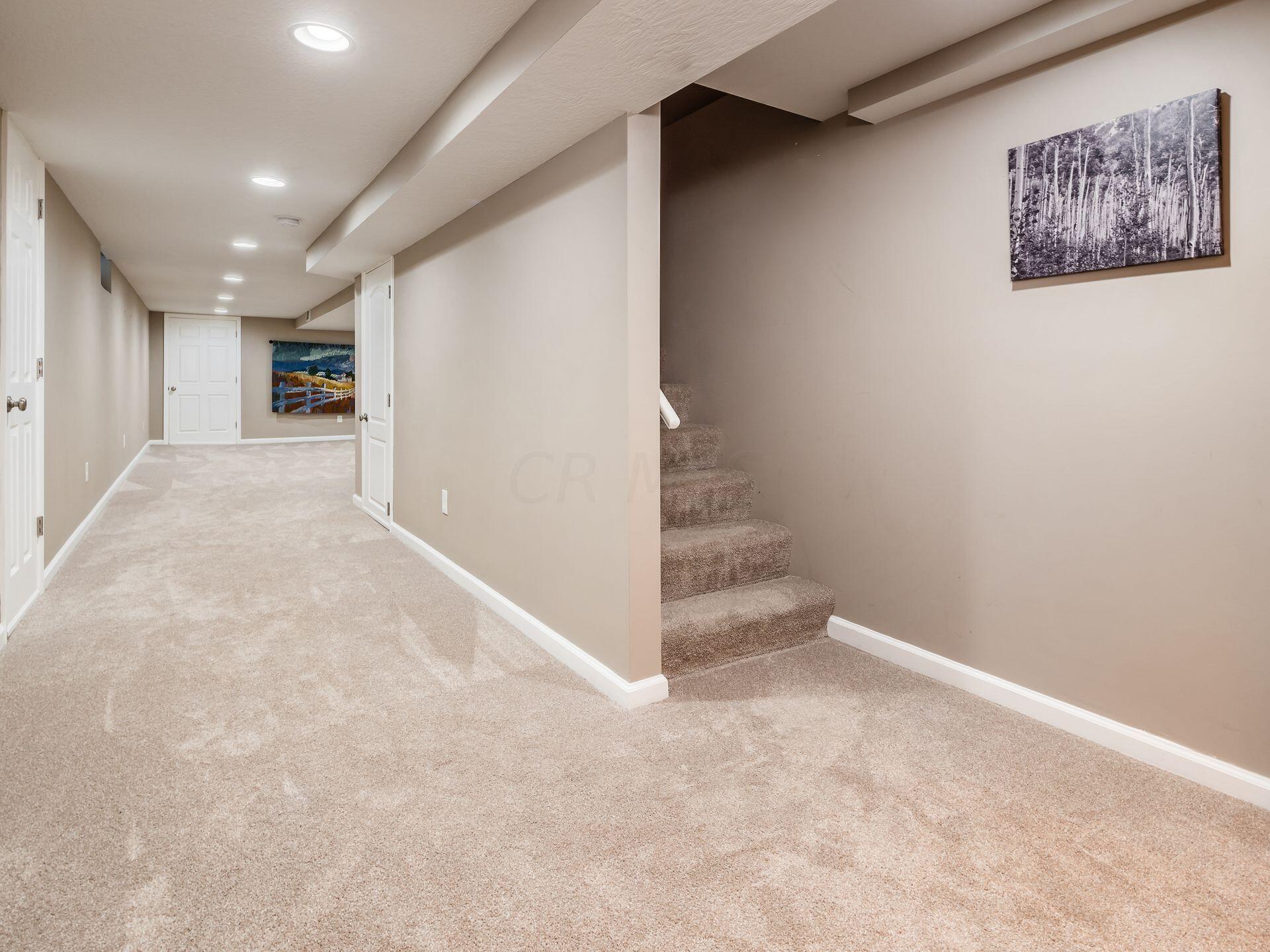 2711 Folkstone Road Columbus, OH 43220 - Photo 46 of 62 Lower Level Room 1, 23'x5-great desk area! Storage under stairs