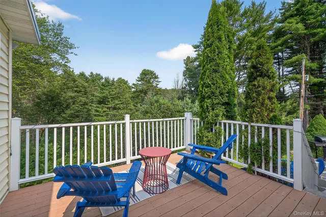 a view of a garage with a white car parked