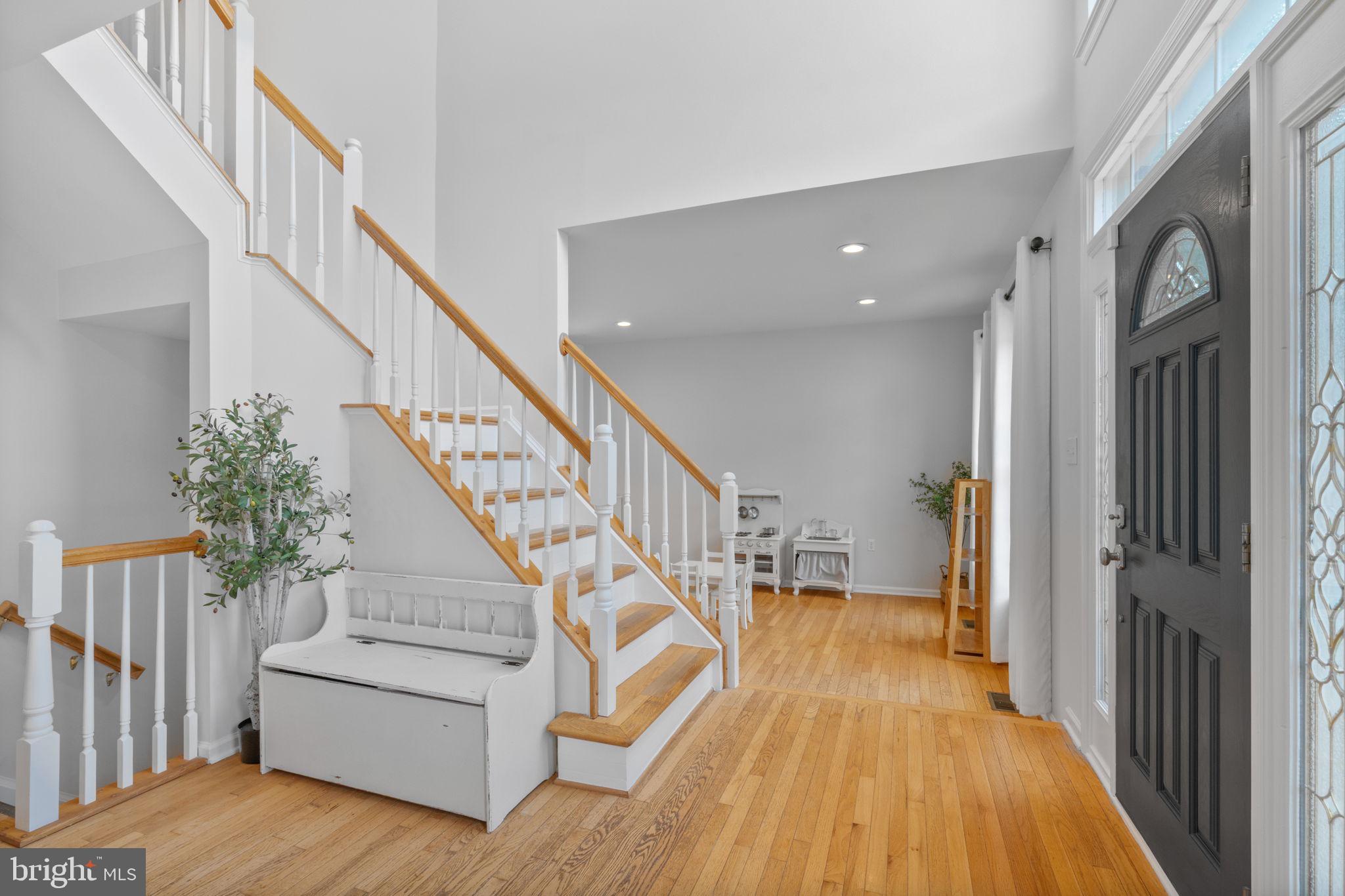 14519 Picket Oaks Road Centreville, VA 20121 - Photo 9 of 61 Angled Center-hall Staircase greets you