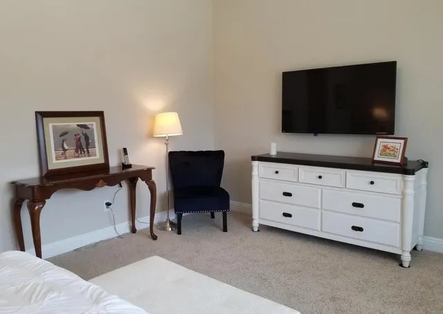 a bathroom with a double vanity sink and mirror