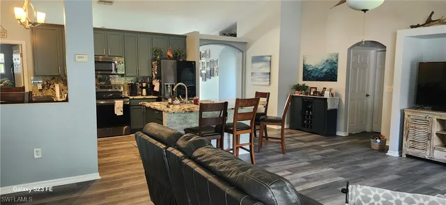 a view of a kitchen area with furniture and window