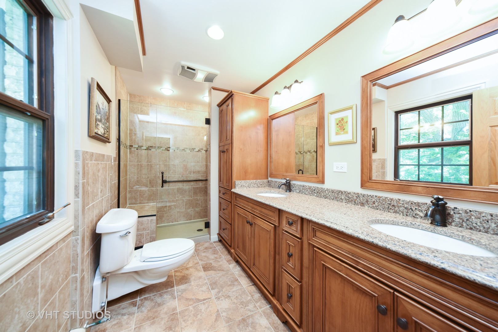 36 Marryat Road Trout Valley, IL 60013 - Photo 12 of 27 a bathroom with a granite countertop sink toilet a large mirror a bathtub and shower