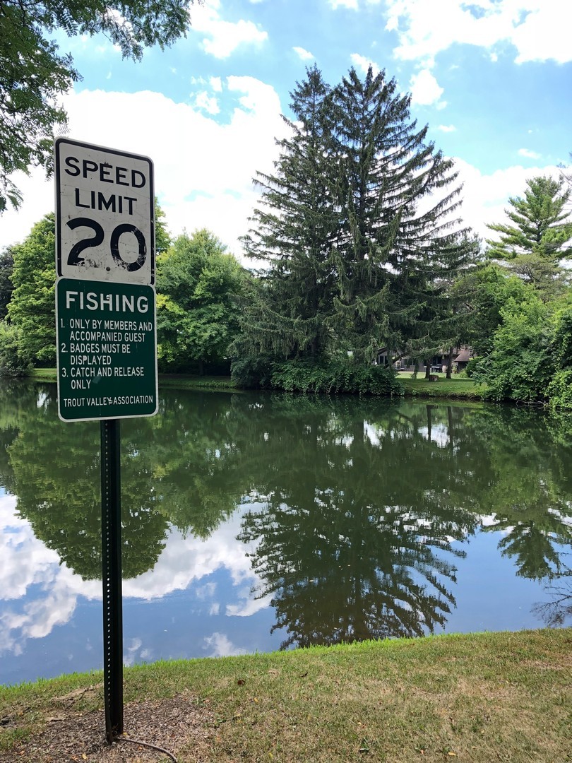 36 Marryat Road Trout Valley, IL 60013 - Photo 27 of 27 a sign on the side of the river
