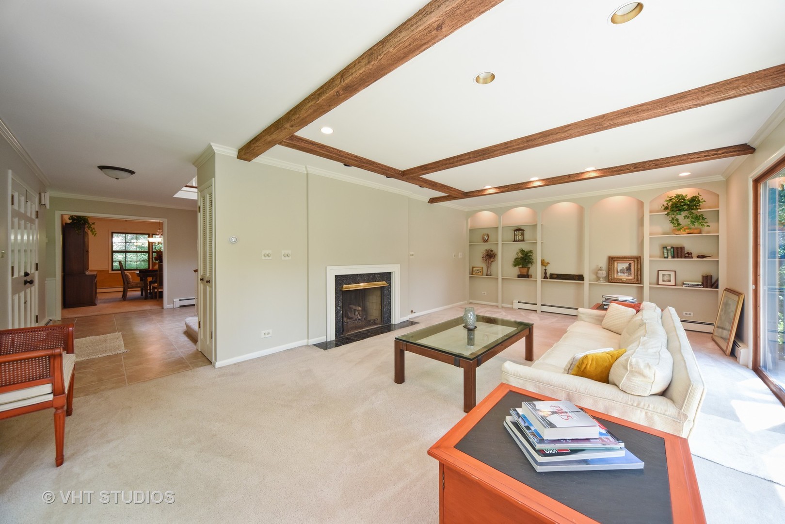 36 Marryat Road Trout Valley, IL 60013 - Photo 4 of 27 a living room with furniture a fireplace and a table