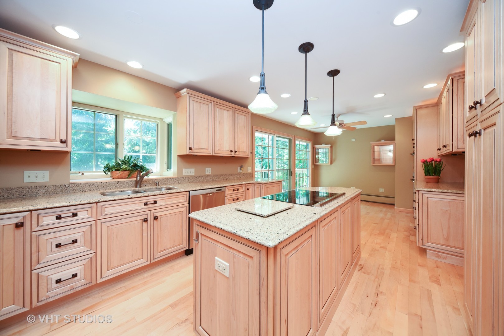 36 Marryat Road Trout Valley, IL 60013 - Photo 5 of 27 a kitchen with a sink stove and wooden cabinets