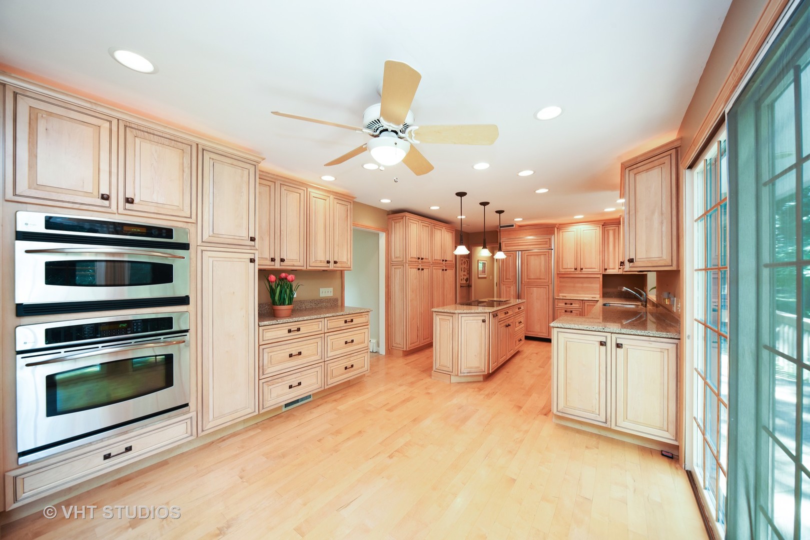 36 Marryat Road Trout Valley, IL 60013 - Photo 6 of 27 a kitchen with white cabinets and stainless steel appliances
