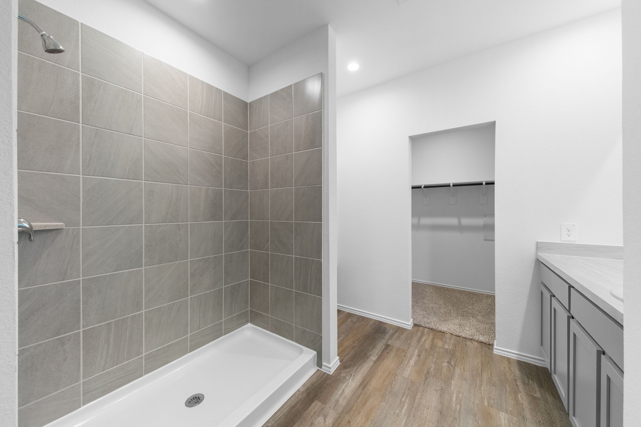 16727 Hemlock Forest Lane Magnolia, TX 77355 - Photo 16 of 35 a bathroom with a shower and a sink