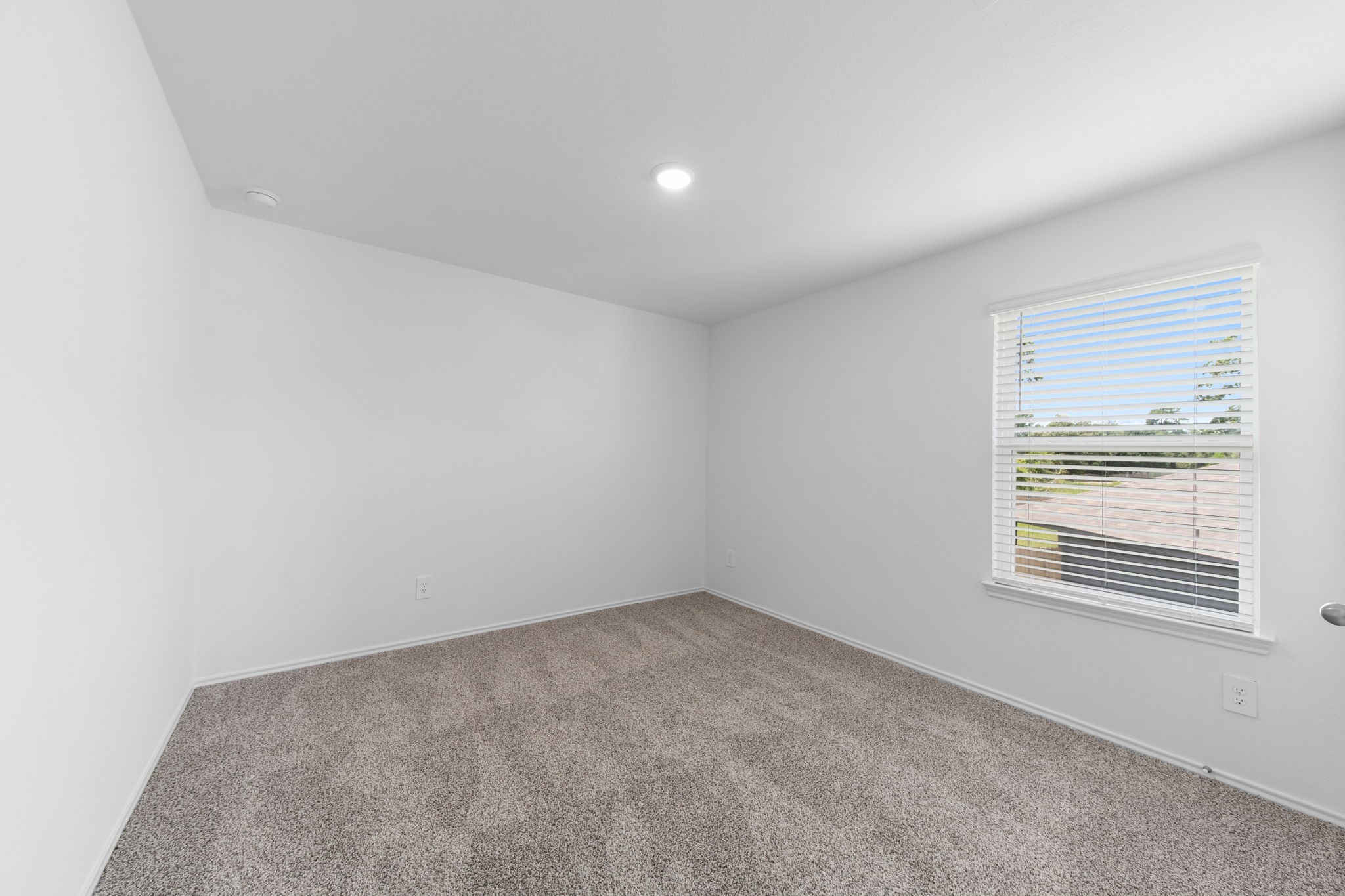 16727 Hemlock Forest Lane Magnolia, TX 77355 - Photo 26 of 35 an empty room with a window