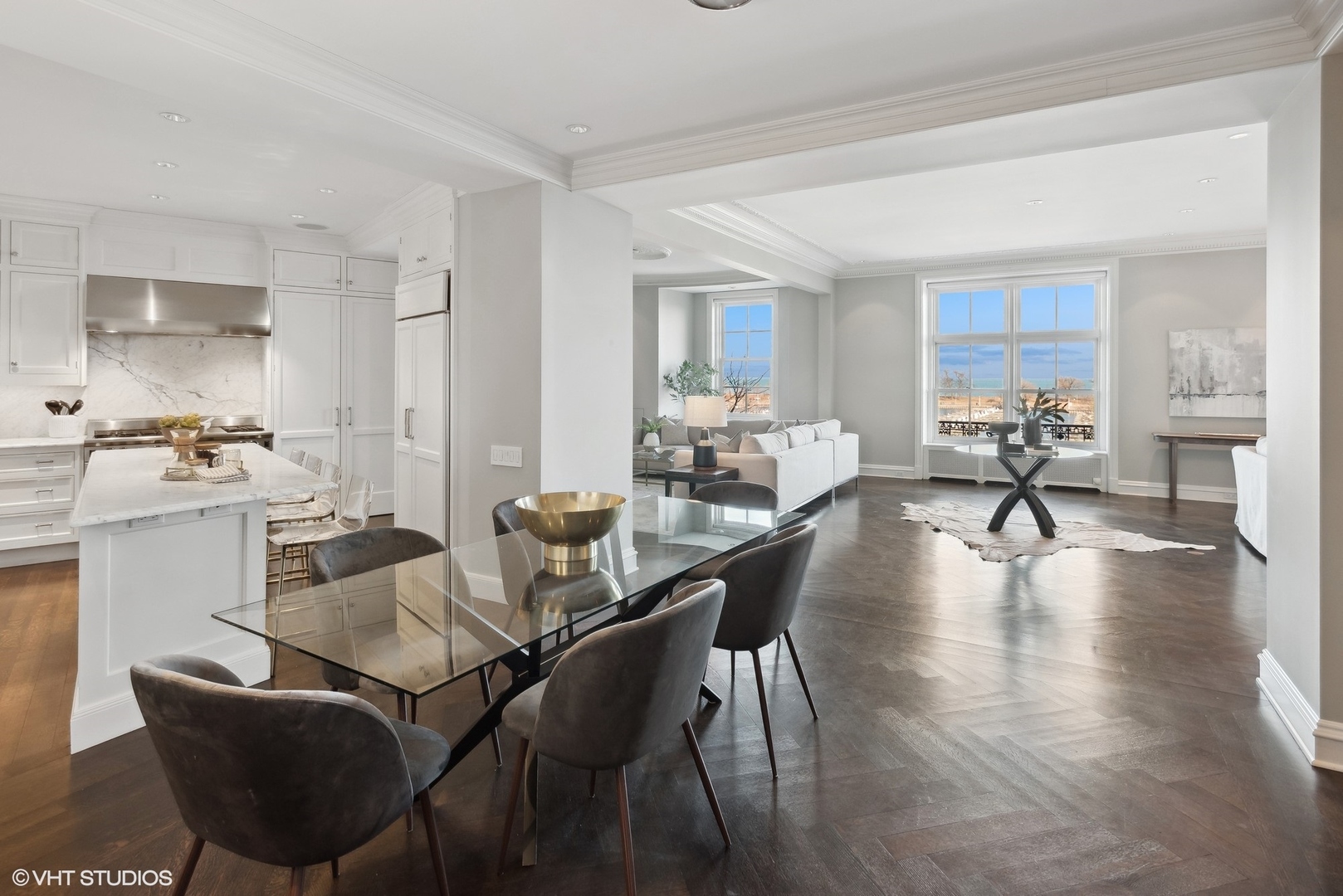 3400 North Lake Shore Drive, Unit 3A Chicago, IL 60657 - Photo 13 of 25 a view of a dining room with furniture window and wooden floor