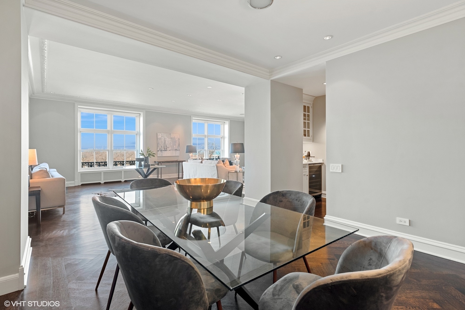 3400 North Lake Shore Drive, Unit 3A Chicago, IL 60657 - Photo 15 of 25 a view of a dining room with furniture and a table