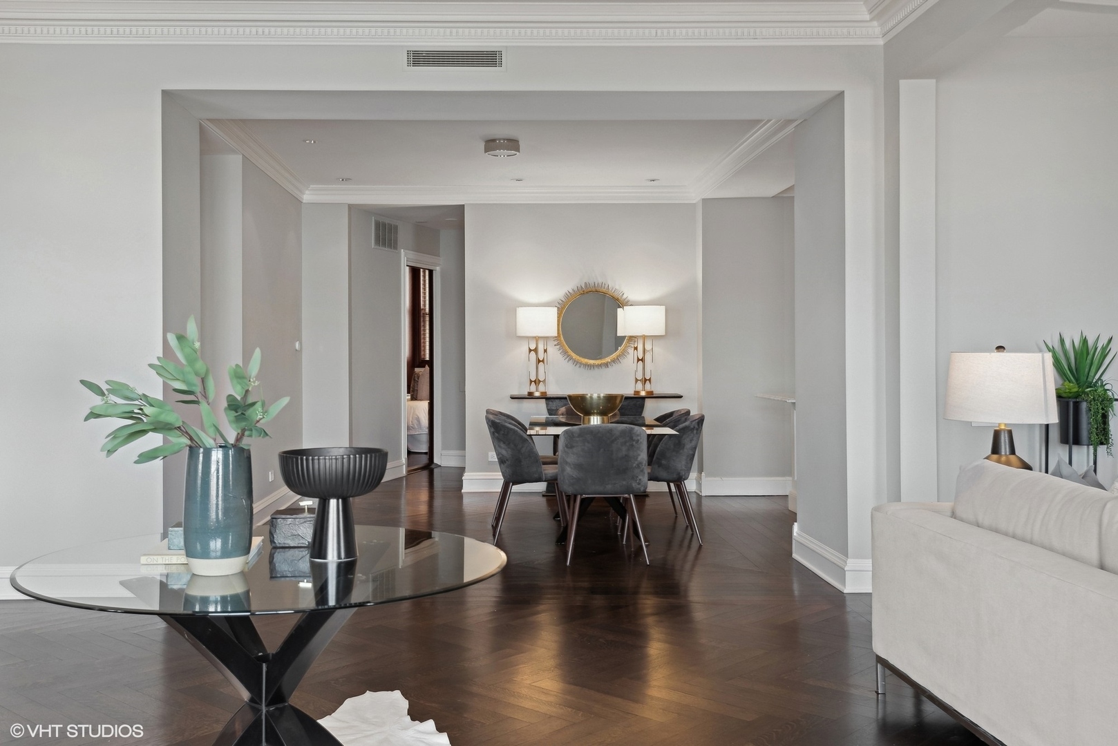 3400 North Lake Shore Drive, Unit 3A Chicago, IL 60657 - Photo 7 of 25 a view of a dining room with furniture and wooden floor