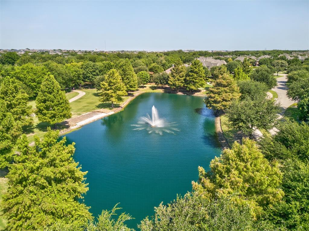 842 Sun Meadow Road Allen, TX 75013 - Photo 33 of 39 Expansive body of water featuring a central fountain