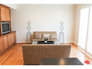 a living room with a couch and a flat screen tv