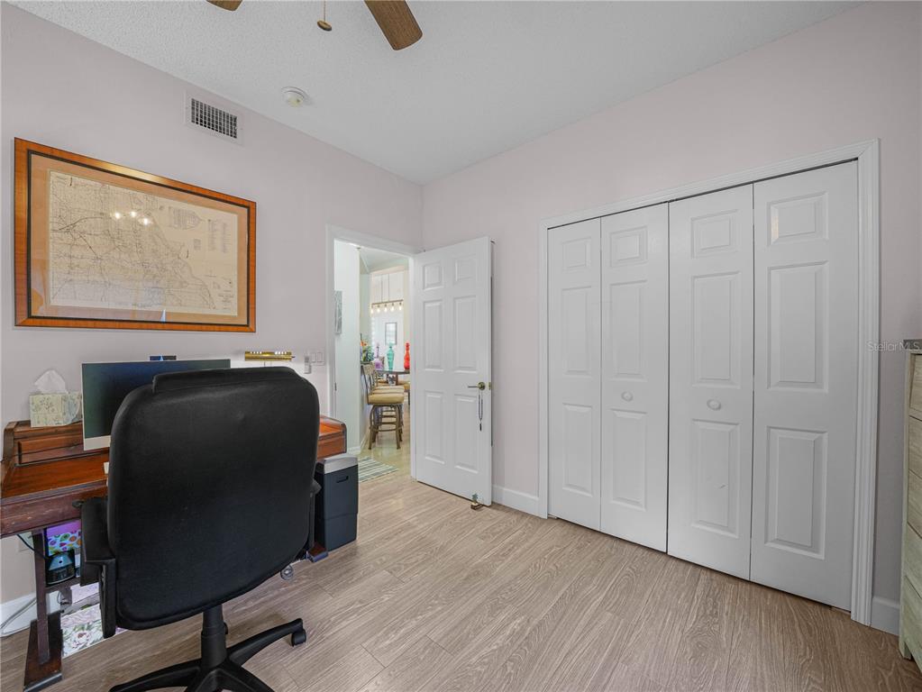 414 Eagle Ridge Drive, Unit 414 Davenport, FL 33837 - Photo 11 of 28 a view of room with workspace and windows