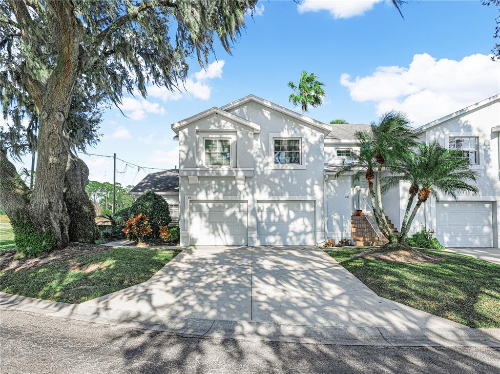 414 Eagle Ridge Drive, Unit 414 Davenport, FL 33837 - Photo 2 of 28 a view of front of house with a yard