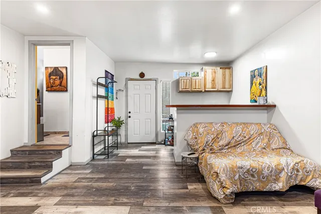 a view of bedroom with furniture and workspace