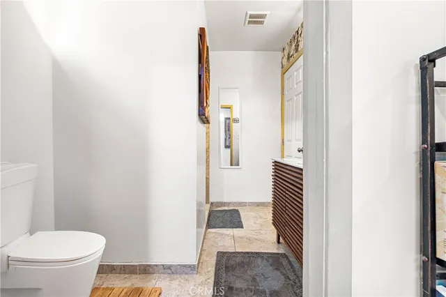 a bathroom with a sink and a toilet
