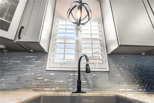 a view of entryway with kitchen