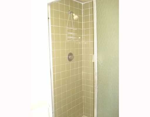 608 Northwest 13th Street, Unit 28 Boca Raton, FL 33486 - Photo 12 of 14 a bathroom with a shower