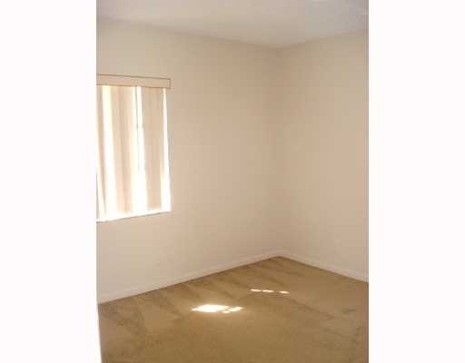 608 Northwest 13th Street, Unit 28 Boca Raton, FL 33486 - Photo 13 of 14 a view of an empty room with a window