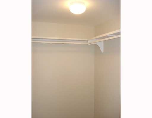 608 Northwest 13th Street, Unit 28 Boca Raton, FL 33486 - Photo 10 of 14 a view of a room with racks on the wall