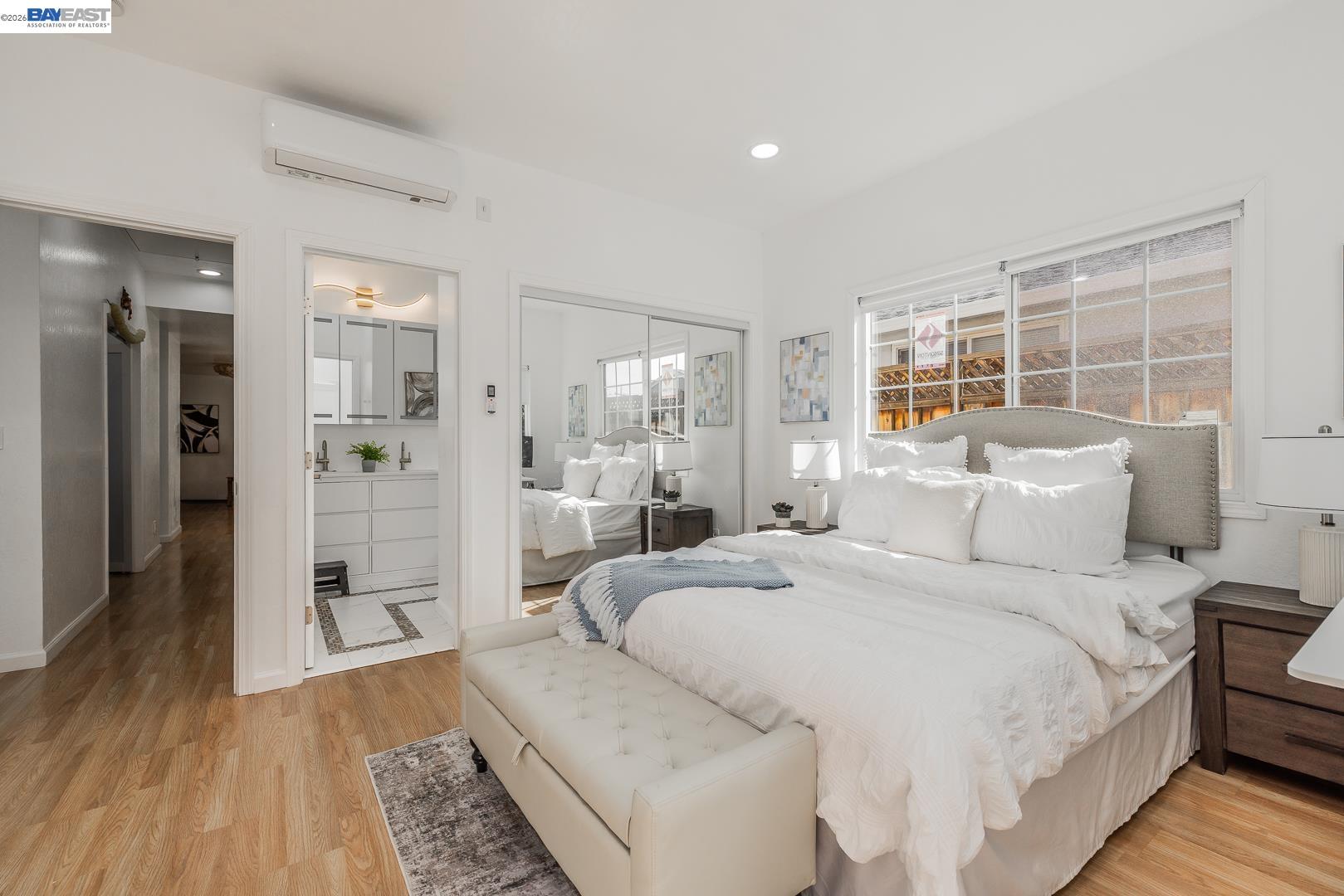 4032 Doane Street Fremont, CA 94538 - Photo 11 of 39 a spacious bedroom with a bed and a wooden floor