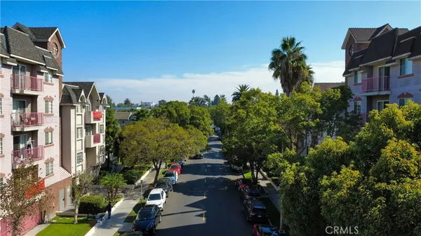 a market with a bunch of flowers and fruits
