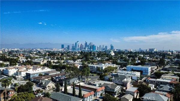 a view of a building with sitting area